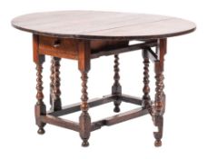 A Charles II oak gateleg table, circa 1670,