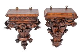 Two similar Victorian carved oak wall brackets in Gothic taste, second half 19th century,