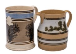 A 19th century mochaware jug and a similar tankard: the jug decorated in green on a cream slip