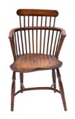 A George III yew and elm Windsor elbow chair, circa 1765,