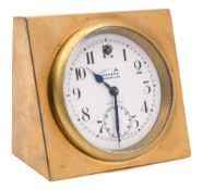 A brass mounted timepiece: the white enamel round dial set aslant and having black Arabic hour