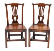 A pair of George II or early George III oak side chairs, circa 1760,