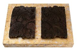 A pair of South East Asian steel silk printing blocks: decorated with swept fern like leaves,