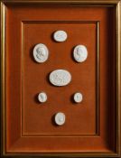 Three framed groups of Grand Tour style plaster cameos: depicting various subjects including Greek