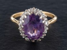 An amethyst and single-cut diamond cluster ring,: estimated diamond weight ca. 0.