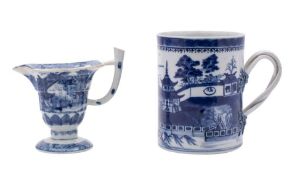A Chinese export porcelain jug and large mug: the former of helmet shaped form painted in blue with