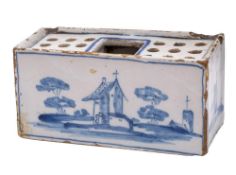 An English delftware flower brick: of small size,