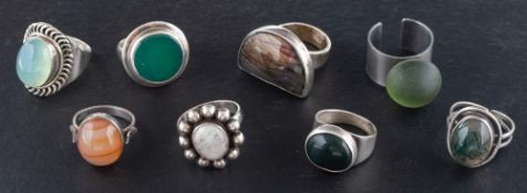 Eight gemset rings,: including moss agate, chalcedony, agate, moonstone, carnelian and spectrolite,