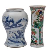 A Chinese blue and white baluster vase and a famille verte sleeve vase: the first painted with a