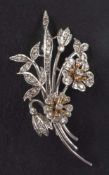 A single-cut diamond floral spray brooch,: estimated total diamond weight ca. 0.40ct, length ca.