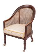 A Regency mahogany and canework library bergere, early 19th century,