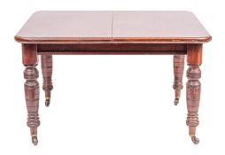 A Victorian mahogany extending dining table, late 19th century.