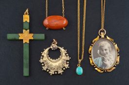 Five pendants,: including a nephrite cruciform pendant, length ca. 6.