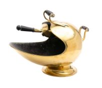 A Victorian brass coal scuttle: of helmet-shaped outline,