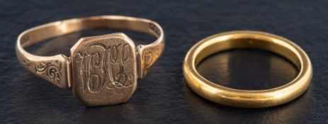 Two gold rings,: including a 22ct gold band ring, hallmarks for Birmingham, 1936, ring size J,