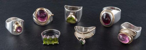 Eight gemset rings,: including pink tourmaline, peridot, and synthetic pink spinel,