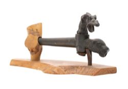 A late 17th/early 18th century bronze spigot tap: the spout in the form of a leopard's head,