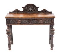 A Victorian carved oak side table in Baroque taste; late 19th century,