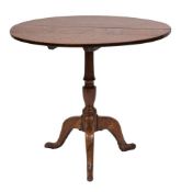 A George III oak circular occasional table, circa 1770,