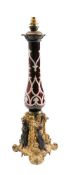 A 19th Century ruby glass and gilt brass lamp: of slender baluster form,