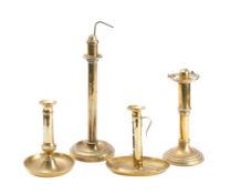 Four assorted 19th century brass ejector candlesticks: 37cm, 25cm and 20cm high (4).