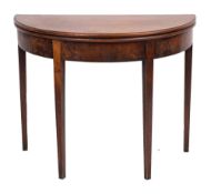 A George III mahogany demi-lune card table, circa 1770,