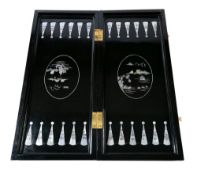 A Singapore black lacquer and mother-of-pearl inlaid folding chess/backgammon board: decorated with