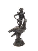 A bronze group, Cupid standing on the back of an eagle: possibly 17th century, 20cm high.
