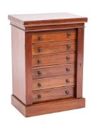 An early Victorian mahogany table top Wellington chest, circa 1840,