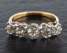 An old-cut diamond, five stone ring,: total estimated diamond weight ca. 1.