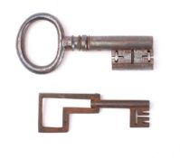 An 18th century steel folding key: 7.6cm long and one other key , possibly 17th/18th century, 9.