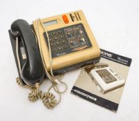 A British Telecom Inphone CT6000 Moneybox telephone with instruction booklet (no key)
