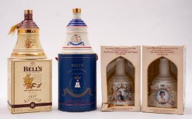 Four Boxed bottles of Bells Whisky: (4)
