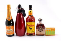 A bottle of Gonzalaz Byass Lepanto Brandy, a bottle of Veterano Brandy,