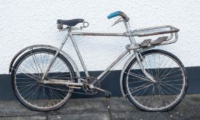 An overpainted delivery bicycle:, maker unknown, with pannier frame to front,