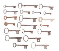 A collection of twenty various keys: including a 5 inch polished steel key and others (20)