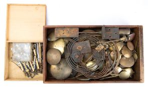 Twenty-five English bracket and wall clock pendulums: along with various bobs and rods,