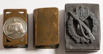 Two WWI German trench art match box holders: one with applied picklehaube,