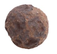 A 10lb cannon ball, origin unknown, 15cm diameter.