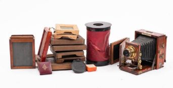 A mahogany and brass 'The Instantograph' quarter plate camera by J Lancaster & Son,
