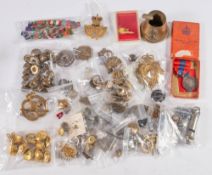 A collection of British Regimental cap badges and buttons: including Tank Regiment, RAF and others,