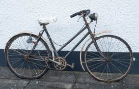 A Hercules Cycle & Motor Co, Ltd ladies bicycle: with black step through frame and cable brakes.