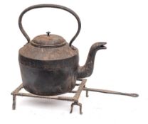 A large Victorian iron kettle:,