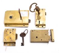 A brass rim lock with drop handle; together with one other brass rim lock,