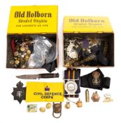 A collection of various regimental cap badges and buttons: including Royal Navy buttons,