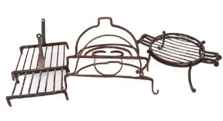 A wrought iron square grid iron:, another rectangular,