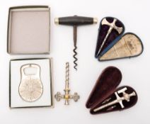 Three early 20th century Champagne taps: together with an ebonised handle corkscrew and a