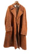An early 20th century Adastra brown leather flying/motoring overcoat: with label as per title,