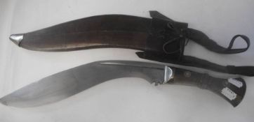 A WWI period army issue Kukri: with 34cm curved blade stamped War Office arrow and 1917,