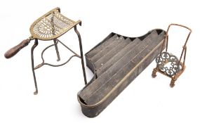 A Victorian brass and steel trivet,